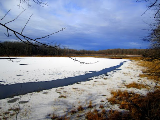 Twin lakes frozen over. Streak is from beaver activity but frozen.