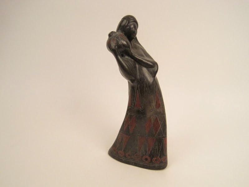Woman with Water Jug Sculpture