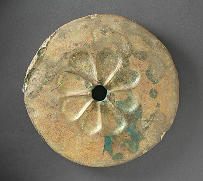 Tile | Origin: Syria | Period: 12th century | Collection: The Madina Collection of Islamic Art, gift of Camilla Chandler Frost (M.2002.1.347) | Type: Ceramic; Architectural element, Fritware, molded and glazed, Diameter: 10 1/8 in. (25.72 cm); Depth: 1 1/8 in. (2.86 cm)