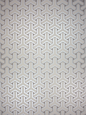 Their Trifid wallpaper features an interlocking Chinese key design with metallic sheen. (osborneandlittle.com)