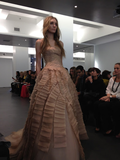 I love this pretty nude color -- it's such a nice alternative to white. Also, the laddering detail and tumbled tulle is quite unique.