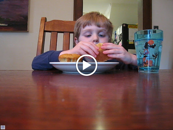 David eats the banana muffins he made with Mommy the day before. &ndash; 22-May-2010