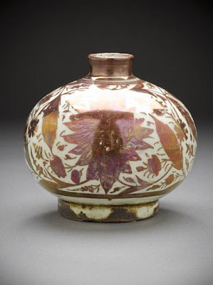 Vase Iran Vase, second half of the 17th century Ceramic; Vessel, Fritware, overglaze luster-painted, 4 3/16 x 4 3/16 in. (10.6 x 10.6 cm) The Nasli M. Heeramaneck Collection, gift of Joan Palevsky (M.73.5.193) Art of the Middle East: Islamic Department.