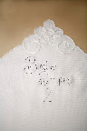 Step 3: Thread your needle, and tie the ends together. Sew directly over the pencil outline. When you're done, make a few short stitches to anchor the thread.