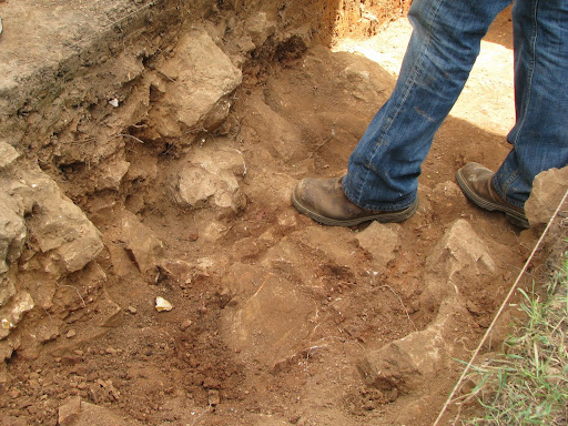 Drury's Dr. Dobson standing on rocks that made up a small part of the fortified trench.
(Photo credit: Jeremy Shreckhise)
