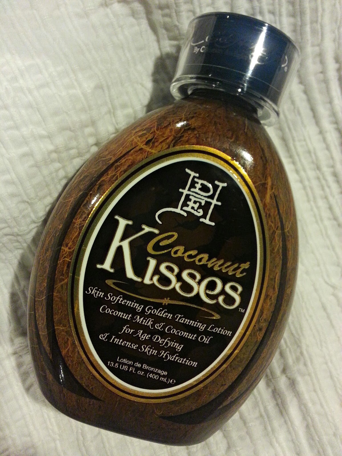 ♡Blog and Reviews♡ Ed Hardy Coconut Kisses tanning lotion review