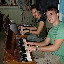 Kyle and Lauren playing the old organ in the old schoolhouse