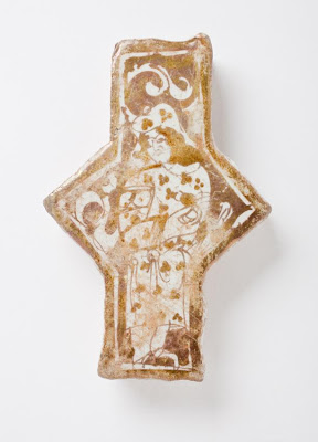Tile | Origin: Iran | Period: late 12th-early 13th century | Collection: The Madina Collection of Islamic Art, gift of Camilla Chandler Frost (M.2002.1.107) | Type: Ceramic; Architectural element, Fritware, glazed and luster-painted, Height: 4 1/2 in. (11.43 cm); Width: 3 in. (7.62 cm)