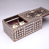 Calligrapher’s storage box bearing the Qur’anic (96:4) inscription “Who taught by the pen.” Turkey, 1700s. Wood, inlaid with tortoiseshell (over gold leaf), ivory, brass, mother-of-pearl, and bone. 5.7 x 12.9 x 8 in. (14.4 x 35.2 x 20.2 cm). Private collection