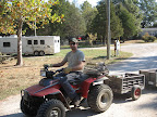 we pick up your manure cart daily and haul off-site with our ATV