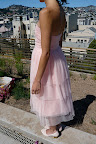 The bride's blush-pink dress was so delicate and feminine.