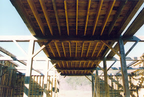 Floor joist sit atop of the tie beam.
