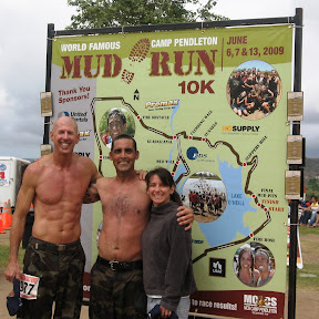 Tom and Sue pose with Mike who is another Mud Run regular.