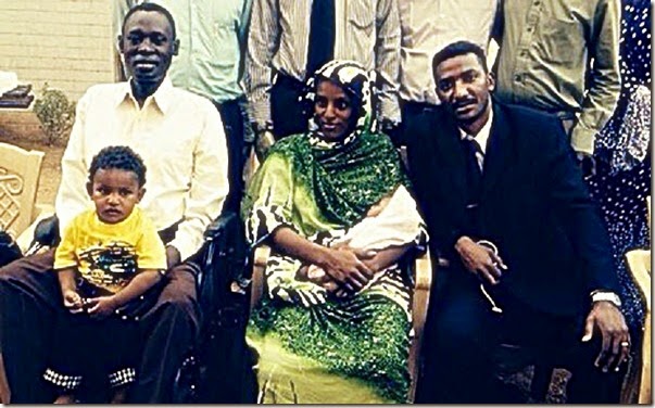 Daniel Wani, holding Martin - Meriam Ibrahim, holding Maya