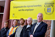Ben joins (from left to right) Victoria Labour Council president Mike Eso, Compensation Employees' Union president David Clarabut, CUPE National president Paul Moist, and CUPE BC president Barry O'Neil at the Day of Mourning for workers killed or injured on the job, Victoria