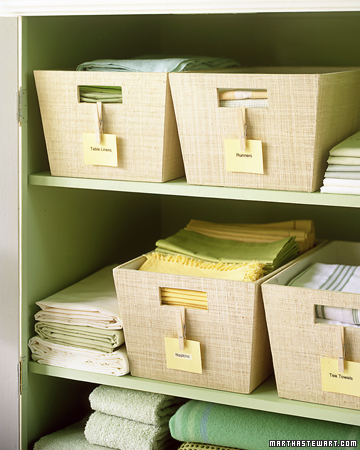 Tags made by attaching unlined index cards to clothespins let you mark anything easily -- from plain shoeboxes to fancier bins, like these natural raffia boxes. Tags made by attaching unlined index cards to clothespins let you mark anything easily -- from plain shoeboxes to fancier bins, like these natural raffia boxes.