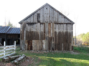 The original stone foundation was excavated and reused.