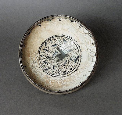 Bowl Iran Bowl, 14th century Ceramic; Vessel, Fritware, white slip, underglaze-painted in black and cobalt blue under a clear glaze, 3 5/8 x 8 1/4 in. (9.21 x 20.96 cm) The Nasli M. Heeramaneck Collection, gift of Joan Palevsky (M.73.5.190) Art of the Middle East: Islamic Department.