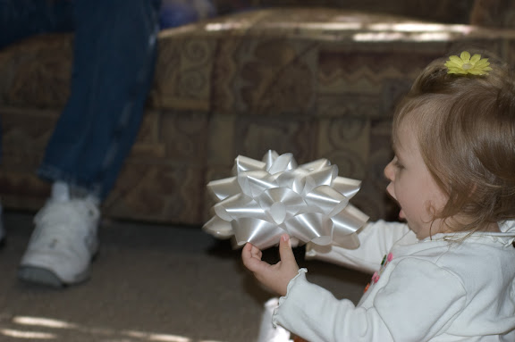 Very excited by the big bow.