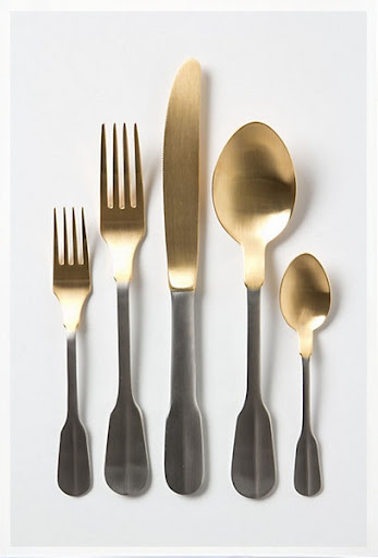 I'm obsessed with mixing metals when it comes to my jewelry so I instantly fell for this gold/silver flatware set. I'm convinced it could make mac'n'cheese fancy. (Anthropologie Gold-Dipped Flatware, $38, http://www.anthropologie.com/) I'm obsessed with mixing metals when it comes to my jewelry so I instantly fell for this gold/silver flatware set. I'm convinced it could make mac'n'cheese fancy. (Anthropologie Gold-Dipped Flatware, $38, http://www.anthropologie.com/)