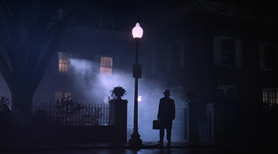 c0 Father Merrin (Max von Sydow), the exorcist, approaches the house in which Regan MacNeil (Linda Blair) lies possessed by the ancient Babylonian deity Pazuzu