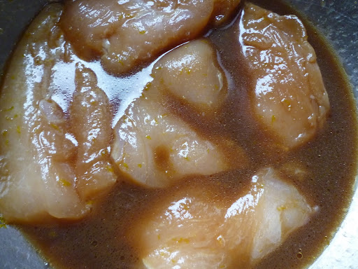 Chicken marinating in soy-ginger mix.