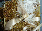 Here's the maid of honor's corsage, which boasts millinery details and soft, satin ribbon. It was made by Brown Paper Designs.