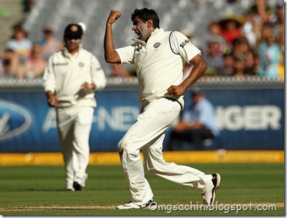 Ravichandran Ashwin of India celebrates the wicket of Nathan Lyon of Australia during day three of the First Test match between Australia and India at the MCG
