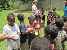 Alex, David, Alexander and the rest of PreK 4 starting the water balloon toss.