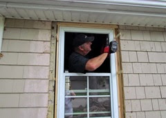 1406089 Jun 08 Terry Screws Window Into House