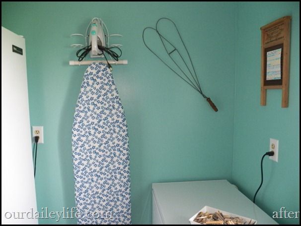 lndry aft 04 laundry room, white baskets, teal walls, vintage washboards as picture frames
