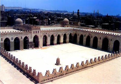 Courtyard of the al-Hakim Mosque in Cairo, 990-1013. The al-Hakim Mosque stood outside the old city wall before al-Jamali had the fortifications renovated.The five-aisled prayer hall has a wide, raised central aisle.The old courtyard, which was allowed to fall into dilapidation and is largely destroyed, was sometimes used as a military barracks in the past, and later as a sports ground. At the beginning of the 20th century it was decided to found the first Museum of Islamic Art in Cairo here. Only in recent years was the mosque completely restored by the Bohras, and resumed its original function.