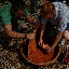 Dave and Kyle staining their t-shirts clay color... with clay