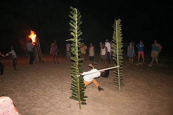 'A bonfire and limbo contest at Coconut Beach in Elmina' Photo by Sandra Vu