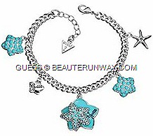 GUESSSpring Summer 2012 Jewellery Ocean Glam collection starfish, statement oversized bib necklace, cuff bracelets, earrings and ringsbwith turquoise enamel aqua genuine crystal accents
