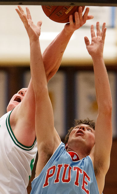 Piute's Ty Jessen, right, and South Summit's Bonner Mitchell reach for a rebound as the 1A All-Stars face the 2A All-Stars at  West Jordan High School Friday, March 30, 2012 in West Jordan, Utah.