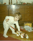 I met Adrienne through rescue work, and she shares my drive to help those who cross our paths -- the ones who have no hope but for us -- and Georgie was just such a one. Georgie had a friend in Adrienne, and so did I. Here's another early shot of Adrienne practicing to care for many real dogs in the future.