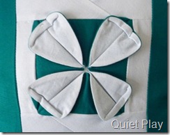 Folded fabric flower