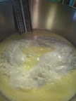 Even more curds and mixture is off heat.