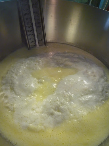 Even more curds and mixture is off heat.