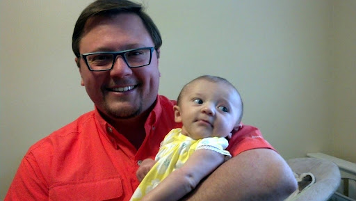 Proud Daddy, happy baby