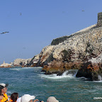 The boats skirt the rocky coasts of Islas Ballestas