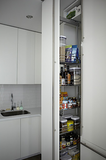 A pull out pantry holds all of my staples. It's fully stocked with everything I need thanks to Martha. A pull out pantry holds all of my staples. It's fully stocked with everything I need thanks to Martha.