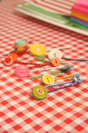 The girls who came to our event loved making these easy and stylish button barrettes. You can learn how to make the same barrettes here: http://www.marthastewart.com/266836/button-hair-clips