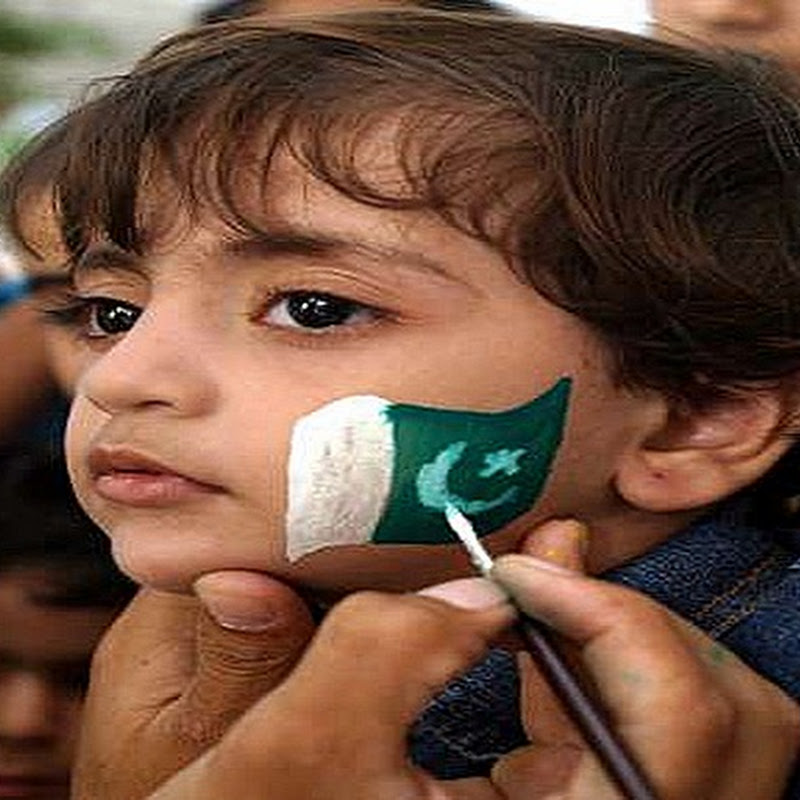 Independence day Pakistani flag tattoo on left cheek