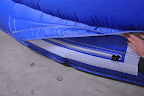 Heavy duty velcro and a zipper to allow air release quickly
