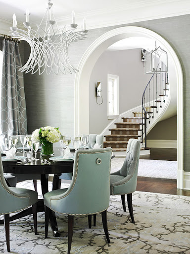 Subdued blues bring a more refined feeling to the scene. via Traditional Home.