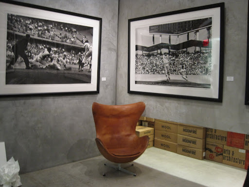 I would love this chair for my apartment - it's an original leather Egg Chair by Danish designer Arne Jacobson from Benedikt Taschen’s personal collection. Reminiscent of baseball glove - fitting for the photos surrounding it.