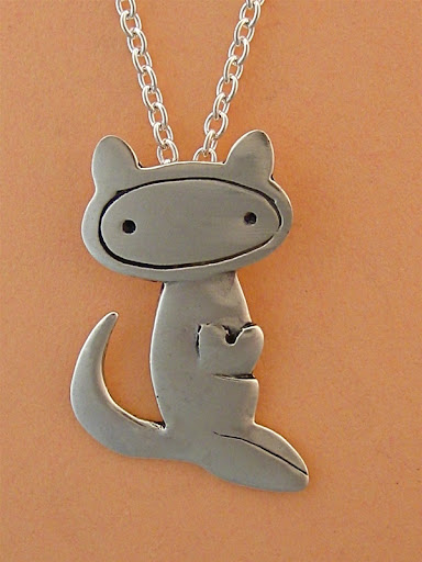 What says mama love better than a kangaroo sporting a heart in her pouch? And mom's love has been known to make some folks want to hop...
Sterling kangaroo necklace by Mark Poulin. What says mama love better than a kangaroo sporting a heart in her pouch? And mom's love has been known to make some folks want to hop...
Sterling kangaroo necklace by Mark Poulin.
