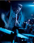 Tres punishing his drums...
